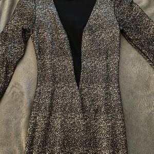 Mesh dress while rest of the dress is gold glitter